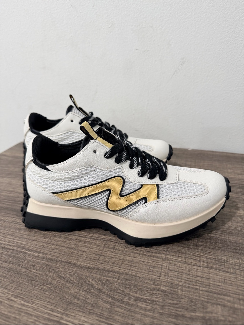 Steve Madden White Sneakers with Gold Accent & Black Trim